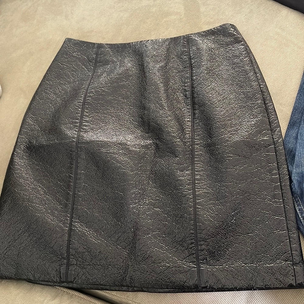 H & M skirt has been used once only has line going through because of hanger